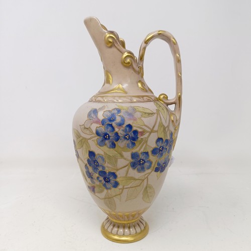 729 - A Doulton Lambeth jug by Frank A Butler, decorated flowers, highlighted in gilt, 26 cm high