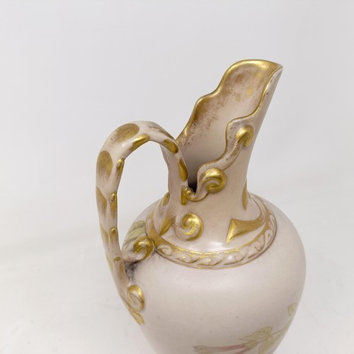 729 - A Doulton Lambeth jug by Frank A Butler, decorated flowers, highlighted in gilt, 26 cm high