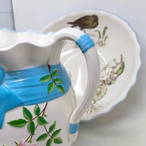 730 - A Minton jug and bowl set, decorated birds (2)