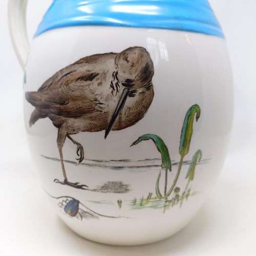 730 - A Minton jug and bowl set, decorated birds (2)