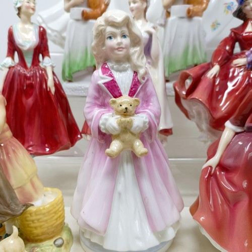 731 - A Royal Doulton figure, Gwynneth Lilac Time HN2137, Faith HN3082, Winter Welcome HN3611, And One For... 