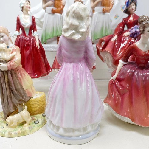 731 - A Royal Doulton figure, Gwynneth Lilac Time HN2137, Faith HN3082, Winter Welcome HN3611, And One For... 