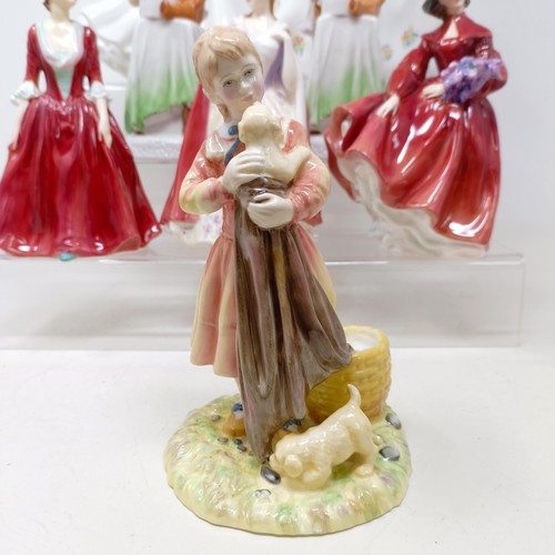 731 - A Royal Doulton figure, Gwynneth Lilac Time HN2137, Faith HN3082, Winter Welcome HN3611, And One For... 