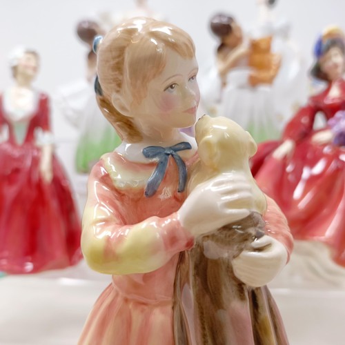 731 - A Royal Doulton figure, Gwynneth Lilac Time HN2137, Faith HN3082, Winter Welcome HN3611, And One For... 