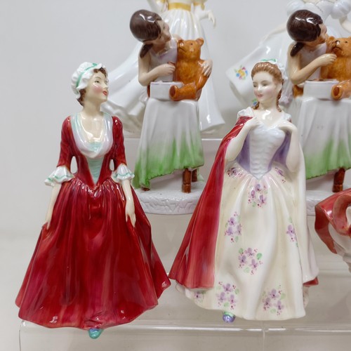 731 - A Royal Doulton figure, Gwynneth Lilac Time HN2137, Faith HN3082, Winter Welcome HN3611, And One For... 