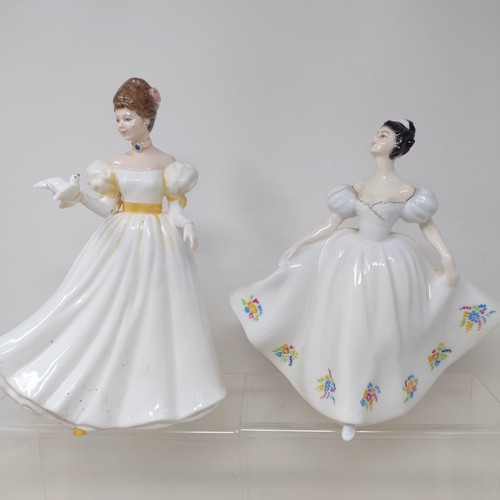 731 - A Royal Doulton figure, Gwynneth Lilac Time HN2137, Faith HN3082, Winter Welcome HN3611, And One For... 