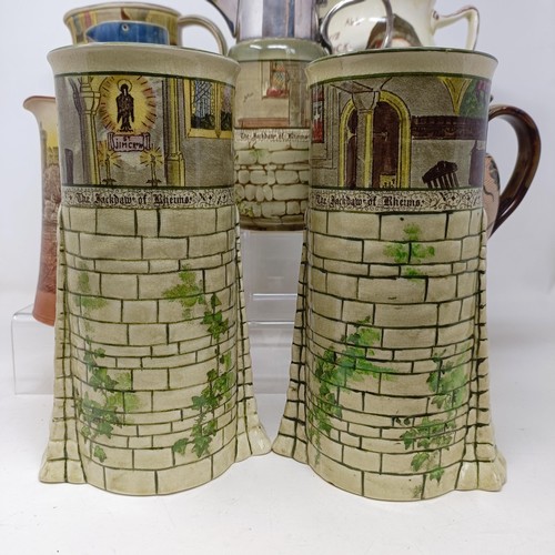 732 - A pair of Royal Doulton Series Ware vases, in the form of castles, a jug, inscribed 'They All Love J... 