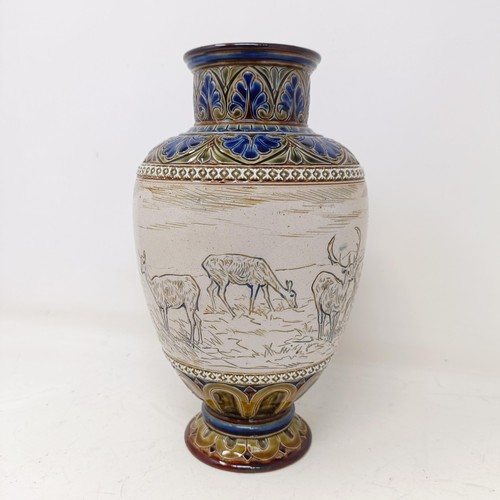 733 - A Doulton Lambeth vase, by Hannah Barlow, decorated a deer, 23 cm high