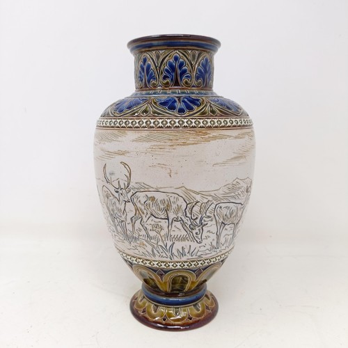 733 - A Doulton Lambeth vase, by Hannah Barlow, decorated a deer, 23 cm high