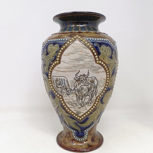 734 - A Royal Doulton vase, by Hannah Barlow, decorated with cows, 27 cm high