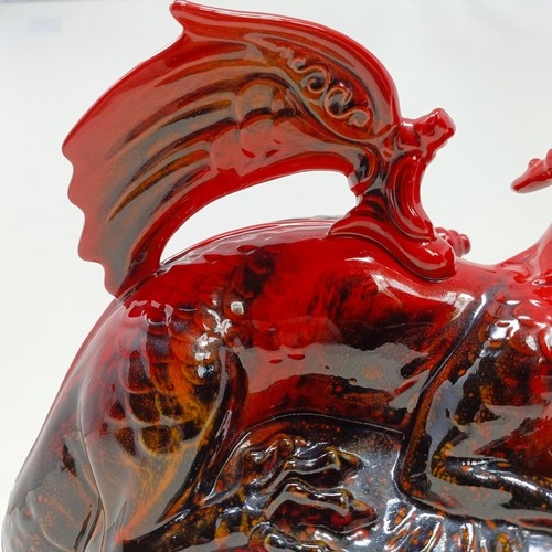 741 - A Royal Doulton Flambé dragon, 30 cm wide