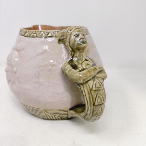 742 - A Doulton Lambeth jug, by Edward Kemeys, decorated with native American Indians, 13 cm high