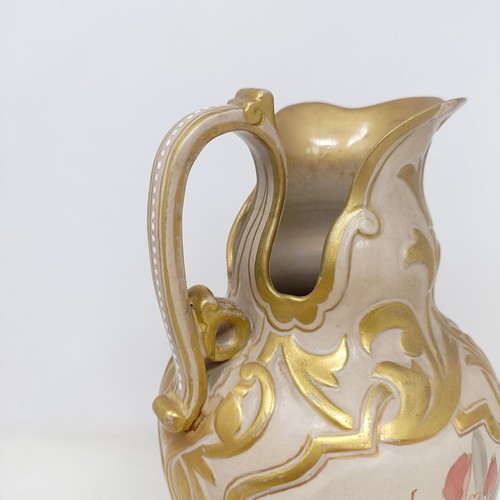 743 - A Doulton Lambeth ewer, by Frank A Butler, decorated with flowers, highlighted in gilt, 30 cm high