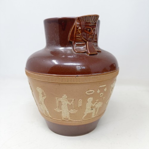 744 - A graduated set of Doulton Lambeth jugs, 20 cm, 18 cm and 14 cm, and another similar, 18 cm (4)