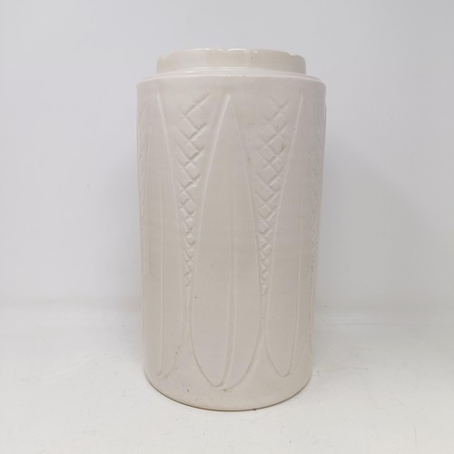 747 - A Royal Doulton vase, with incised decoration, 31 cm high