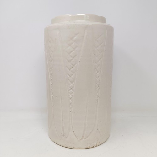 747 - A Royal Doulton vase, with incised decoration, 31 cm high