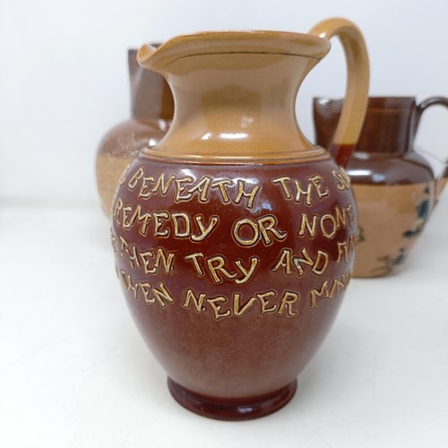 749 - A Doulton Lambeth jug, with a motto, 'For Every Ill Beneath The Sun There Is A Remedy Or None...' 18... 