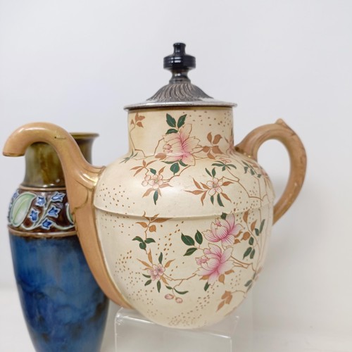 750 - A Royal Doulton Flambé vase, 17 cm high, a Doulton Burslem teapot, two Doulton vases and two ... 