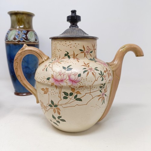 750 - A Royal Doulton Flambé vase, 17 cm high, a Doulton Burslem teapot, two Doulton vases and two ... 