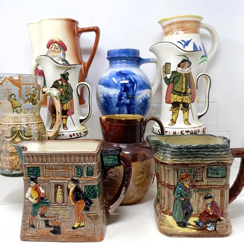 753 - A Royal Doulton jug, decorated figure, 21 cm high, a Royal Doulton jug, Oliver Twist D5617, and The ... 