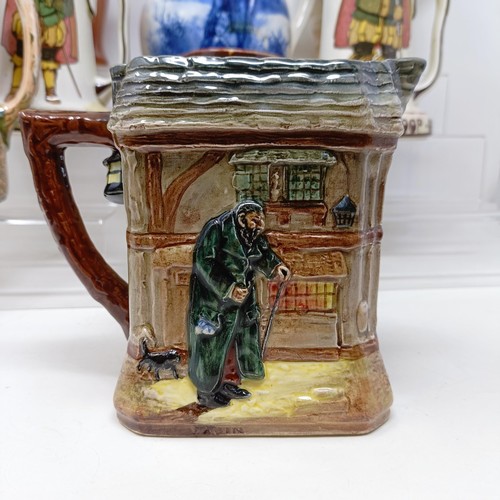 753 - A Royal Doulton jug, decorated figure, 21 cm high, a Royal Doulton jug, Oliver Twist D5617, and The ... 