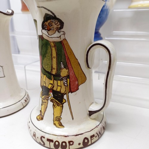 753 - A Royal Doulton jug, decorated figure, 21 cm high, a Royal Doulton jug, Oliver Twist D5617, and The ... 