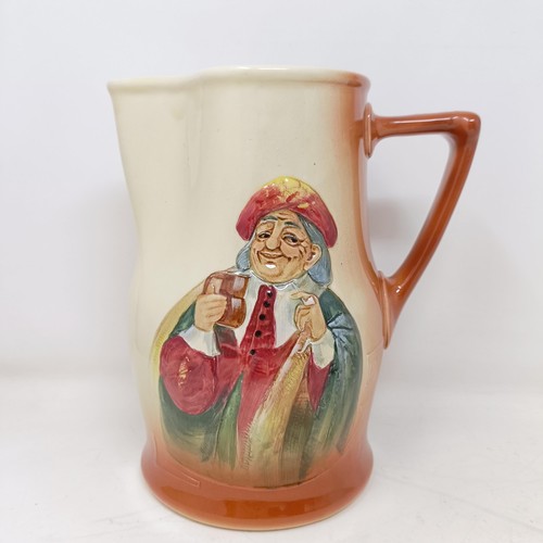 753 - A Royal Doulton jug, decorated figure, 21 cm high, a Royal Doulton jug, Oliver Twist D5617, and The ... 