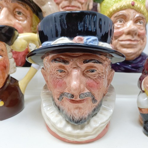 755 - A Royal Doulton character jug, The Falconer D6533, Viking D6496, a Toby jug, Jolly Toby, a character... 