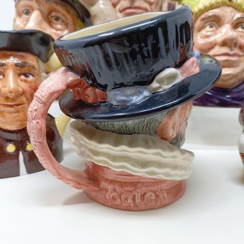 755 - A Royal Doulton character jug, The Falconer D6533, Viking D6496, a Toby jug, Jolly Toby, a character... 