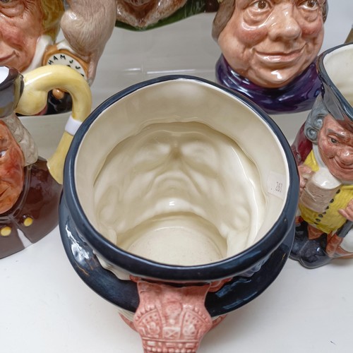 755 - A Royal Doulton character jug, The Falconer D6533, Viking D6496, a Toby jug, Jolly Toby, a character... 