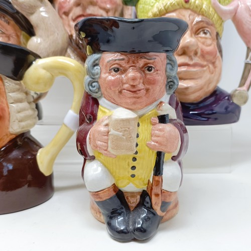 755 - A Royal Doulton character jug, The Falconer D6533, Viking D6496, a Toby jug, Jolly Toby, a character... 