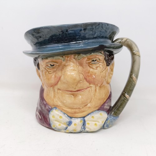 755 - A Royal Doulton character jug, The Falconer D6533, Viking D6496, a Toby jug, Jolly Toby, a character... 