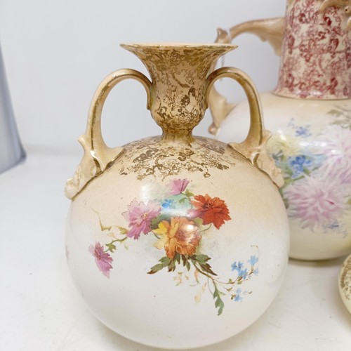 758 - A Doulton Burslem ewer, decorated flowers, 34 cm high, a vase, 28 cm high, a twin handled vase, 18 c... 