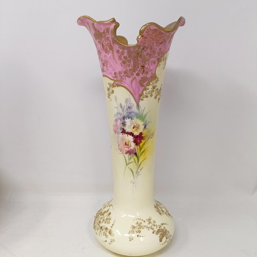 758 - A Doulton Burslem ewer, decorated flowers, 34 cm high, a vase, 28 cm high, a twin handled vase, 18 c... 