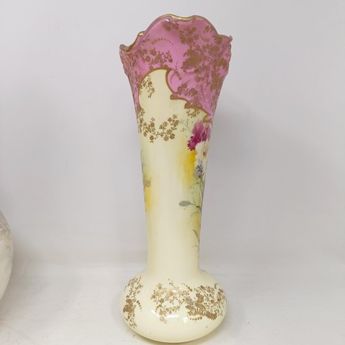 758 - A Doulton Burslem ewer, decorated flowers, 34 cm high, a vase, 28 cm high, a twin handled vase, 18 c... 