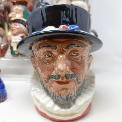 760 - A Royal Doulton character jug, Robinson Crusoe D6532, Beefeater D6206, a Royal Doulton figure, The P... 