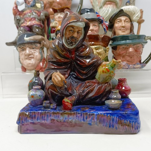 760 - A Royal Doulton character jug, Robinson Crusoe D6532, Beefeater D6206, a Royal Doulton figure, The P... 