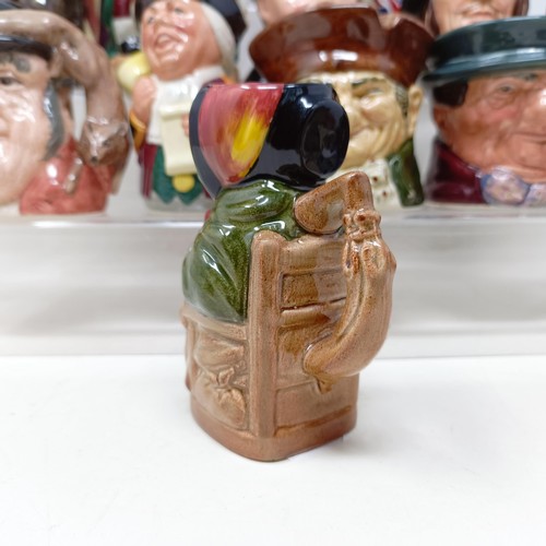 760 - A Royal Doulton character jug, Robinson Crusoe D6532, Beefeater D6206, a Royal Doulton figure, The P... 