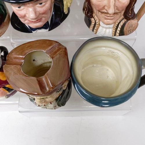 760 - A Royal Doulton character jug, Robinson Crusoe D6532, Beefeater D6206, a Royal Doulton figure, The P... 