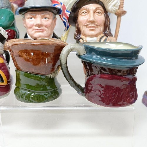 760 - A Royal Doulton character jug, Robinson Crusoe D6532, Beefeater D6206, a Royal Doulton figure, The P... 