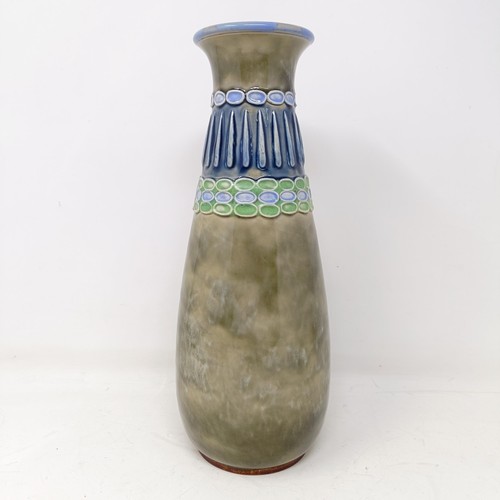 764 - A Royal Doulton stoneware vase, by Bessie Newberry, 30 cm high, a Doulton Lambeth jug, 12 cm high, a... 