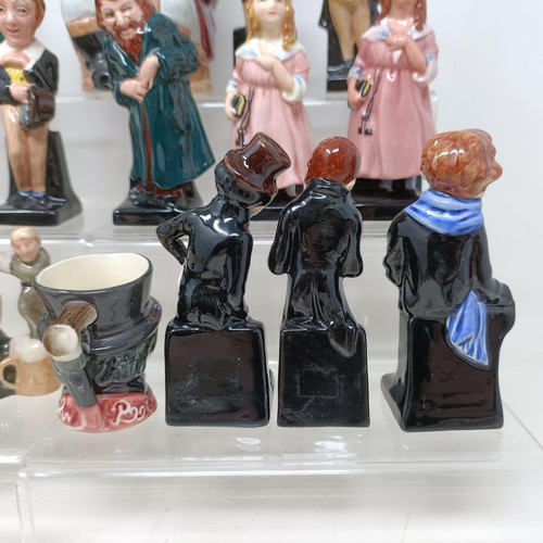 766 - A Royal Doulton Dickens figure, Sam Weller, Uriah Heep, Tiny Tim, Tony Weller, David Copperfield, Fa... 