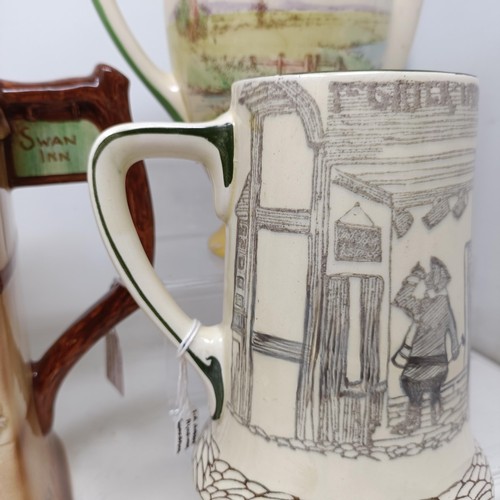 767 - A Royal Doulton Dickens Ware musical jug, The Gaffers Story, 20 cm high, a coffee pot, decorated lan... 