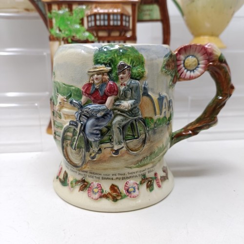 767 - A Royal Doulton Dickens Ware musical jug, The Gaffers Story, 20 cm high, a coffee pot, decorated lan... 