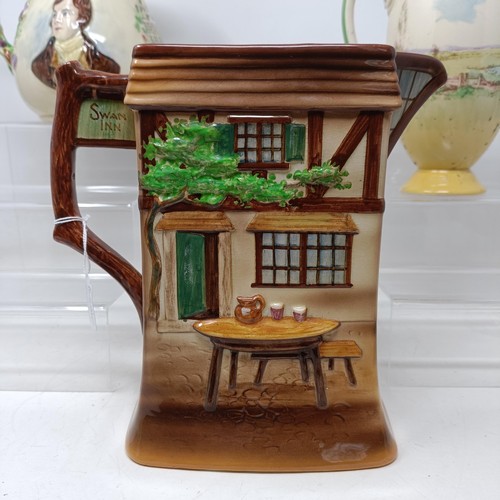 767 - A Royal Doulton Dickens Ware musical jug, The Gaffers Story, 20 cm high, a coffee pot, decorated lan... 