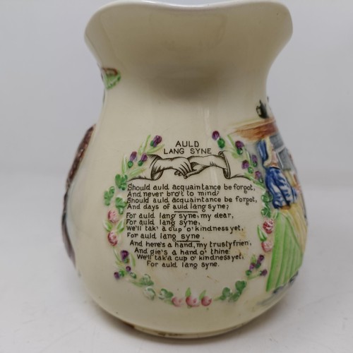 767 - A Royal Doulton Dickens Ware musical jug, The Gaffers Story, 20 cm high, a coffee pot, decorated lan... 