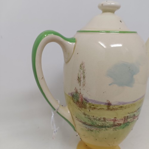 767 - A Royal Doulton Dickens Ware musical jug, The Gaffers Story, 20 cm high, a coffee pot, decorated lan... 