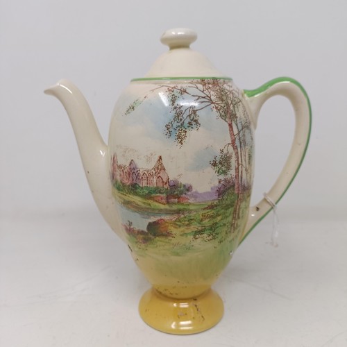 767 - A Royal Doulton Dickens Ware musical jug, The Gaffers Story, 20 cm high, a coffee pot, decorated lan... 