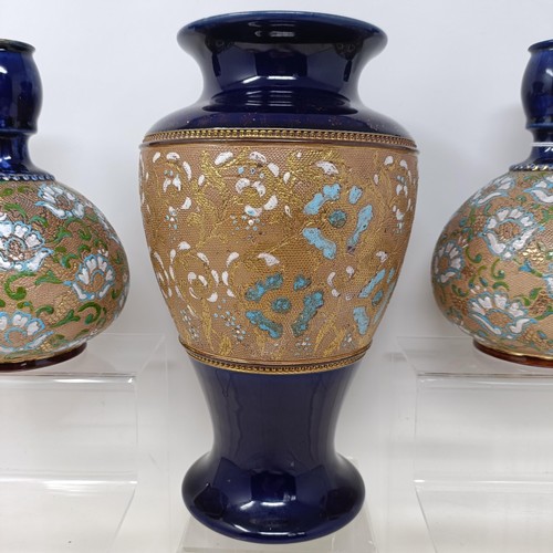 771 - A pair of Royal Doulton ewers, 29 cm high, a Royal Doulton vase, 24 cm high, a pair of Royal Doulton... 