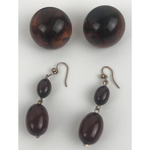 883 - An amber necklace, and two similar pairs of earringsProvenance:  Sold on behalf of Tenovus Cancer Ca... 